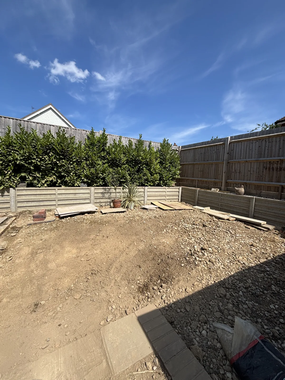 Garden cleared and levelled with brick retaining edges going in